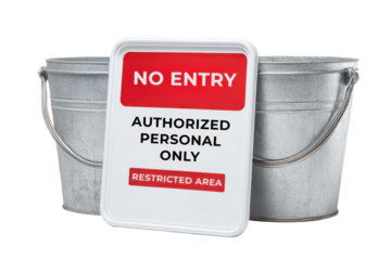 A metal sign reading "NO ENTRY" hangs in front of two metal buckets, indicating access restrictions for authorized personnel only.