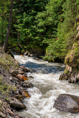 Fototapeta premium The beautiful valley of a mountain river in Khevsureti, Georgia.