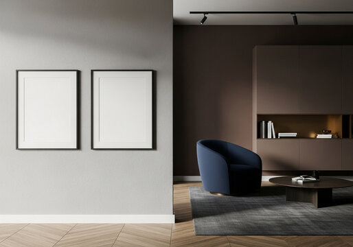 Modern living room interior with blank picture frames and stylish furniture