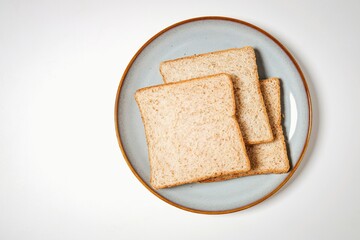 whole wheat bread on white background