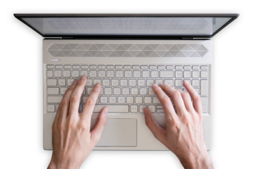 top view of a laptop on transparent background with hands typing on the keyboard