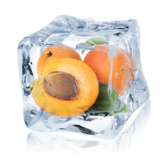 Ripe apricot fruits in ice cube isolated on white. Frozen food