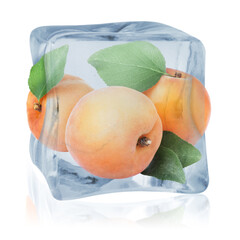 Ripe apricot fruits with green leaves in ice cube isolated on white. Frozen food