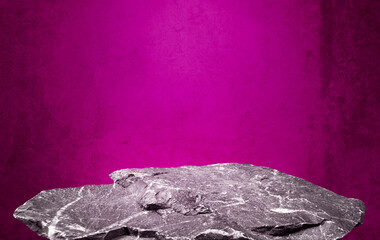 stone granite podium at foreground with pink concrete background and light from above. Product...
