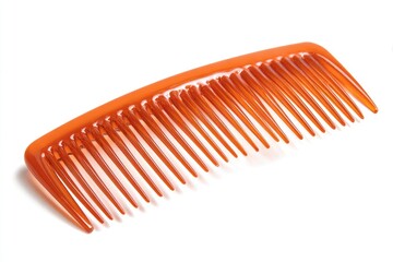 Orange plastic comb on white background (1)