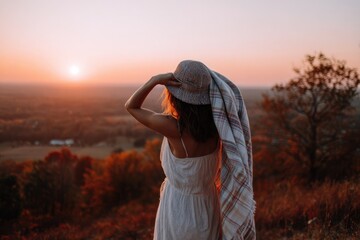 Sunset Serenity: Woman Contemplating Autumnal Landscape