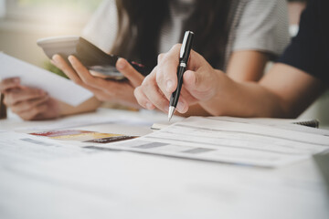 household finance debt concept, wife and husband calculate monthly family expense and worrying about credit card debt.