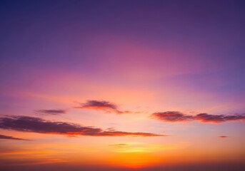 Fototapeta premium Vibrant sunset with orange, pink, and purple hues painting the sky, creating a beautiful and serene atmosphere