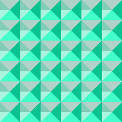 Geometric pattern of green and gray triangles creating a modern, abstract visual texture for design.