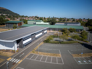 Contemporary industrial business park with commercial warehouses, logistics distribution hub,...