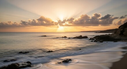 Golden sunset over a tranquil coastline
