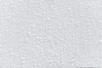 A white background with many small white dots