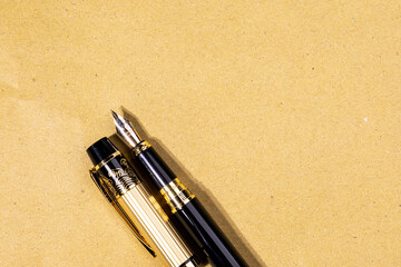 Classic legal background featuring a fountain pen resting on blank paper, representing...