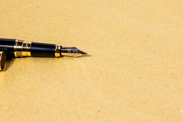 Classic legal background featuring a fountain pen resting on blank paper, representing...