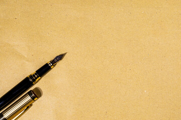 Classic legal background featuring a fountain pen resting on blank paper, representing...