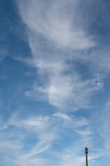 Cirrocumulus clouds float across the sky like cotton wool