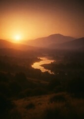Obraz premium Serene sunset over a tranquil river with mountains in the background