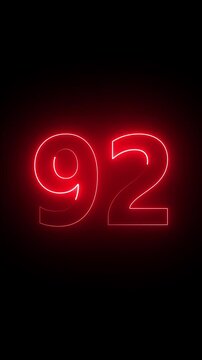 Glowing red color neon 92 text, Educational concept ,red 92 number, promote advertising concept isolate using QuickTime black background 4k animation .