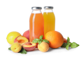 Tasty juice in glass bottles, fruits and herbs isolated on white
