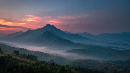 Serene Mountain Landscape at Dusk With Soft Mist and Colorful Sky