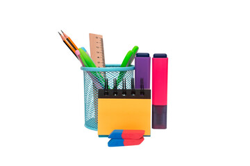 School and office supplies, pens, pencils, ruler, compass in a metal cup on a white background.