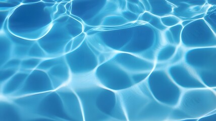 Abstract blue water surface ripples and light reflections