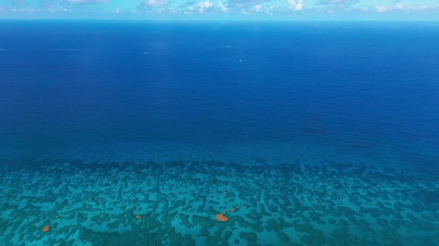 Tropical Ocean Aerial View Over Shallow Coral Reefs