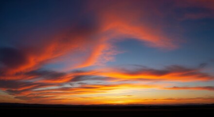 Obraz premium Vibrant Sunset Sky Painted With Fiery Clouds Over the Horizon