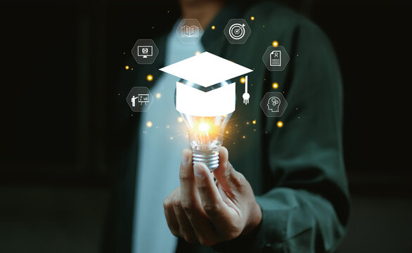 E-learning graduate certificate program concept. Man hands showing graduation hat in light bulb, Internet education course degree, study knowledge, creative thinking idea, problem-solving solution.