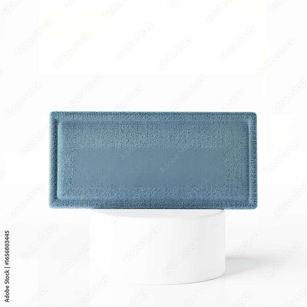 Poster a close up shot of a blue rectangular object on a white cylindrical platform in a studio setting