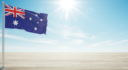 Australian flag waving proudly against a bright blue sky with a prominent sunburst.
