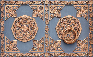 Forged floral patterns on metal gates