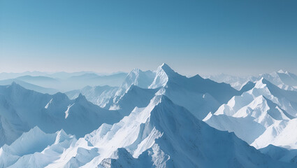 Glacier Ridge from Above: Sweeping snow-capped peaks viewed from a high vantage point, with crisp blue skies and distant ridgelines.