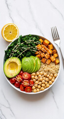 Healthy buddha bowl with kale sweet potato avocado chickpeas tomatoes and lemon