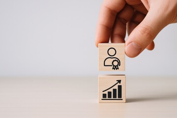 Building Excellence: Hand Stacking Wooden Blocks Representing Skills, Achievement, and Professional Growth on a Neutral Background