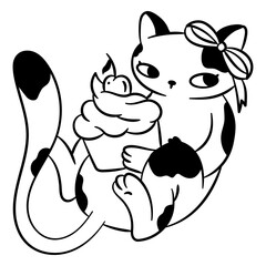 Playful cat with cupcake