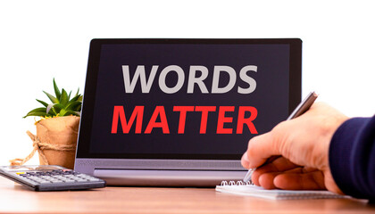 Words matter symbol. Concept word Words matter on beautiful black tablet. Businessman's hand with...