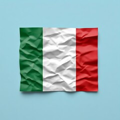 Obraz premium Crumpled Italian Flag on a Light Blue Background