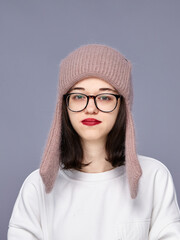 Charming girl wearing a hat indoors