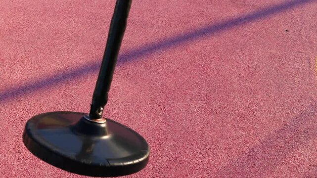 swing moving in bright sunlight outdoor concept