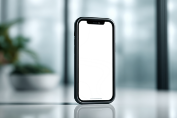 A black iPhone is sitting on a table with a white background. PNG transparency.