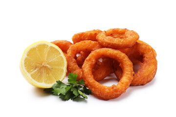 Fried squid rings, lemon and parsley isolated on white