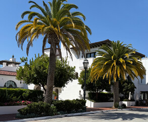 Fototapeta premium Santa Barbara downtown public parking structure in Spanish mission revival style under blue sky