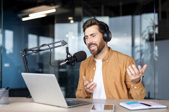 Man recording a podcast at a professional setup in a modern office