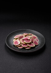 Dried sublimated fig slices as an ingredient for sweet desserts. Dried figs