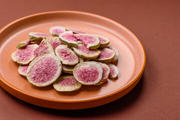 Dried sublimated fig slices as an ingredient for sweet desserts. Dried figs