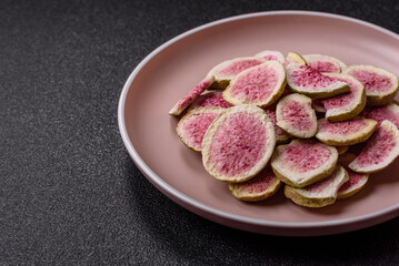 Dried sublimated fig slices as an ingredient for sweet desserts. Dried figs