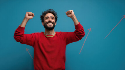 Naklejka premium Joyful man celebrating success with raised arms against blue background, expressing happiness and excitement. vibrant color enhances positive mood of image