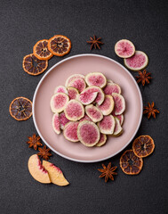 Dried sublimated fig slices as an ingredient for sweet desserts. Dried figs
