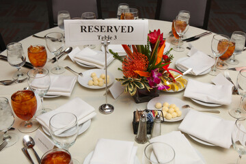 Reserved Dinner Table Floral Centerpiece Drinks Formal Gathering
